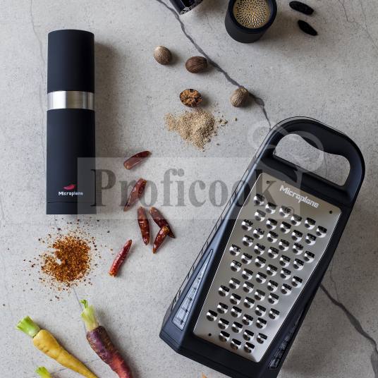 Microplane four sided grater with a container